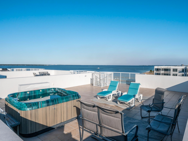 Sweeping views of Bay and Gulf from Private rooftop patio